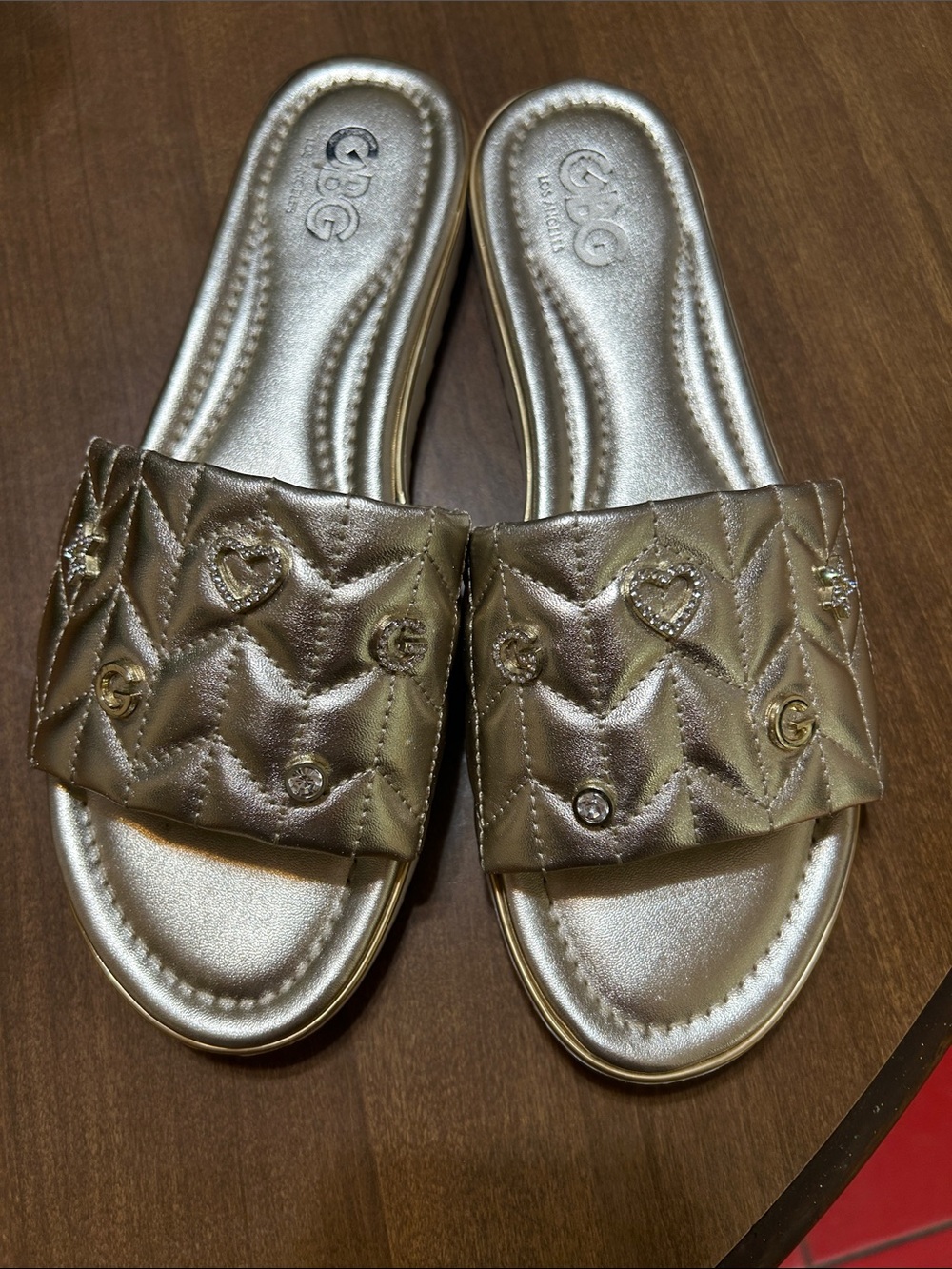 GBG Los Angeles Metallic Gold Quilted Slide Sandals in size 10.
